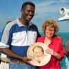 Helene and Luis Clarke with the commemorative plate going in the sea
